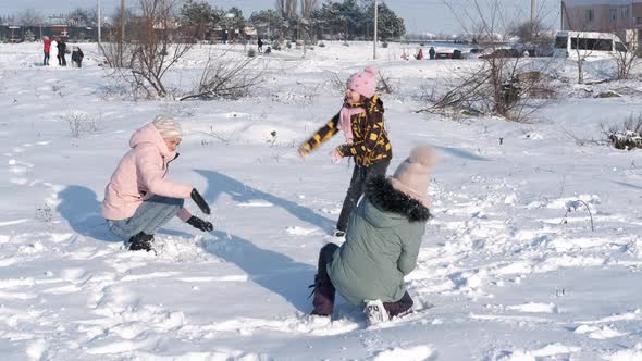 Snow Ball Fighting in Winter