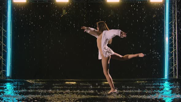 Contemporary Sensual Ballet Choreography Performed By Slender Flexible Ballerina Amidst the