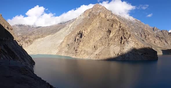 Pan Right Across Of Attabad Lake From Viewpoint On Sunny Clear Day