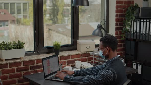 Business Man Working on Financial Management in Office