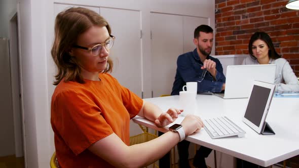 Female executive working at desk