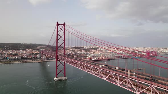 Aerial Panorama View Over the 25 De Abril Bridge in Lisbon Portugal