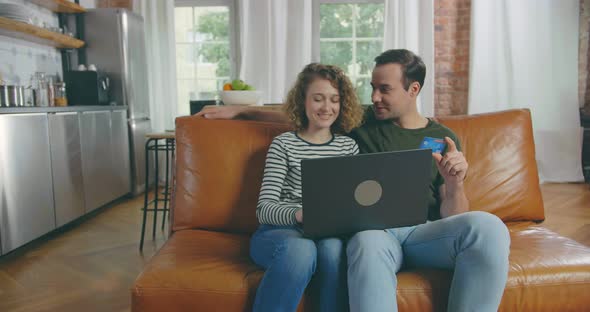 Young Couple Shopping Online