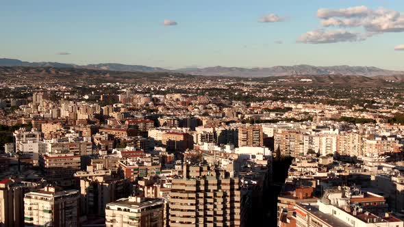 Aerial view of Murcia City in Spain surrounded by mountains in summer