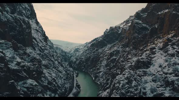 top view of a train between mountains