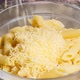 Grated cheese falling on plate with Italian penne rigate pasta. Cheese fell in the deep transparent - VideoHive Item for Sale