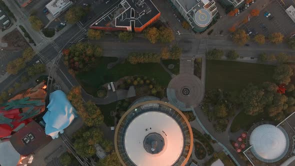 Overhead aerial of the Seattle Space Needle at sunset.