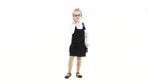 Little Girl Business Lady Talking on Smartphone on White Background