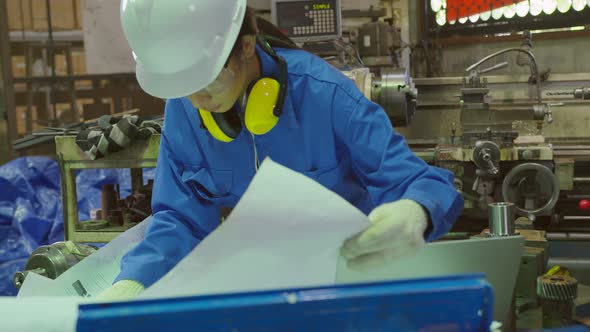 asian female Professional engineering wearing uniform and safety goggles