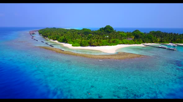 Aerial top view sky of idyllic island beach trip by blue ocean and white sandy background of a dayou