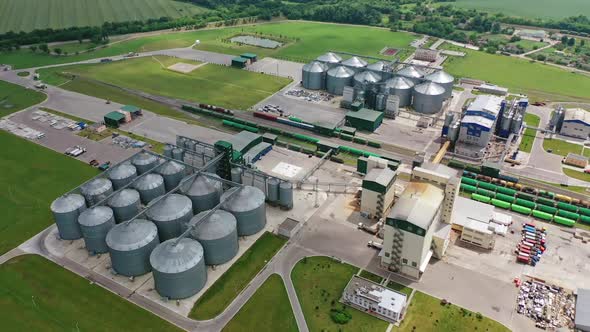 Aerial view of grain elevator. Aerial drone view of large granary in field