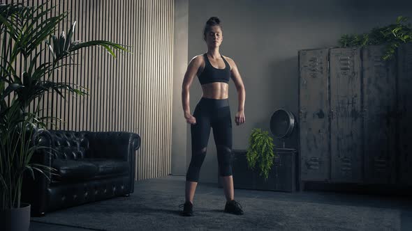 Sweaty and Tired Sporty Brunette Woman Stretching After Intense Workout at Home. Slow Motion