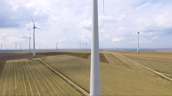 Aerial shot of power generating windmill