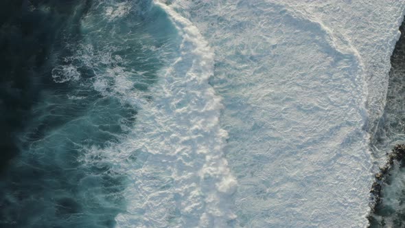 Aerial view of waves at Black Sand Beach, Saint Joseph, Reunion.