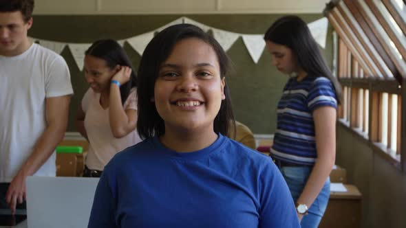 Portrait of teenage girl in a school classroom