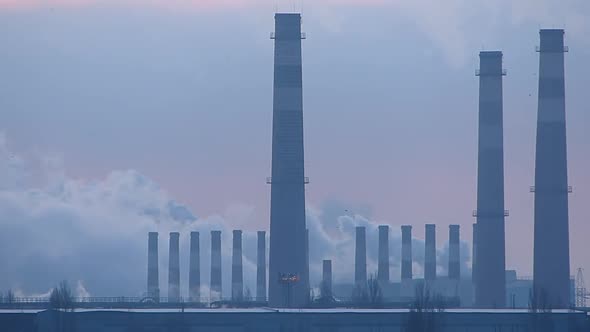 Lots of smoking chimneys. Industrial smoke. Heavy industry pattern.