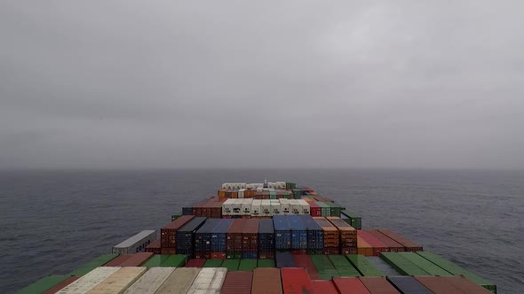 Onboard of huge Container ship during underway, center view, foggy weather.