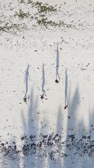 Vertical Video People Play Football on the Beach in Zanzibar Tanzania