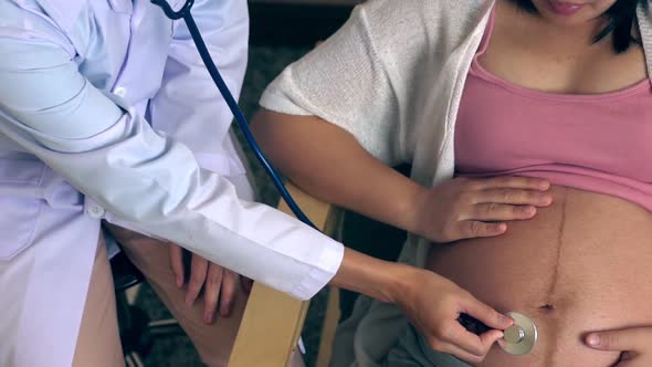 Pregnant Woman and Gynecologist Doctor at Hospital