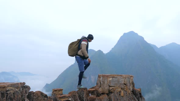 Hiker Hiking At Mountain Top