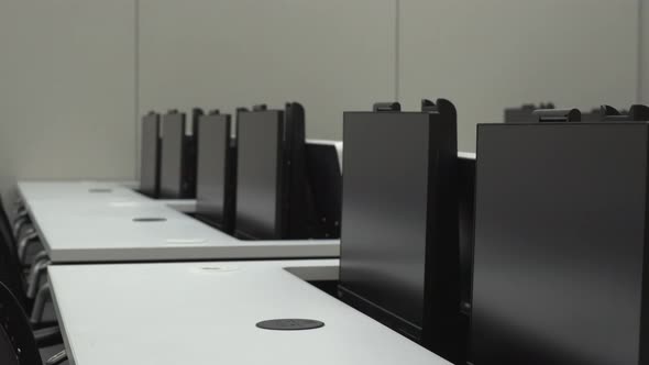 Conference Room Desks with Motorized Monitor Lift Screens Close Up