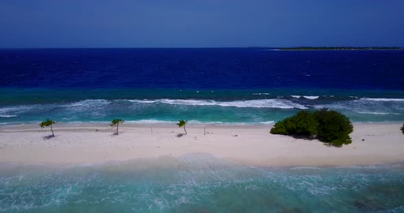 Daytime birds eye clean view of a paradise sunny white sand beach and blue ocean background in hi re