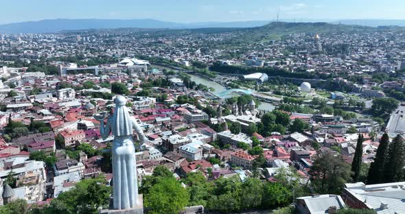 Tbilisi, Georgia - June 12 2022: Aerial view from drone to Monument Mother of Georgia (Kartlis Deda)