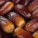 Fresh dates fruits close up, rotation. Eating dried fruits. Vegan, vegetarian food. 4K UHD video - VideoHive Item for Sale