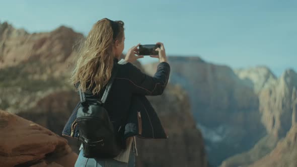 Girl Taking Photo in Zion Park