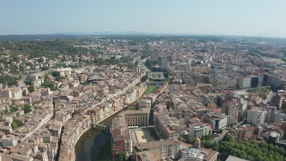 Drone Flight Over Girona Buildings and River Onyar