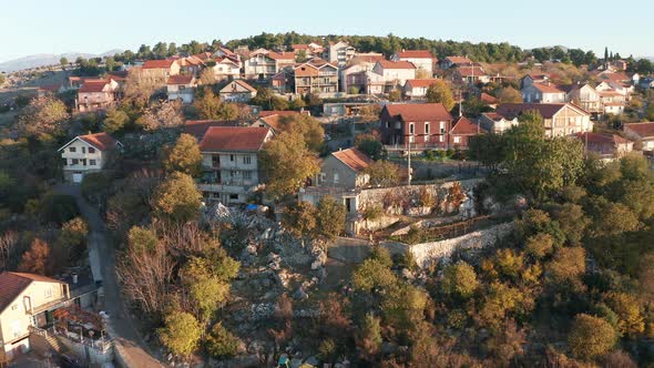 Houses on a rocky hill - suburban neighborhood on the hillside. Illegal residential settlement