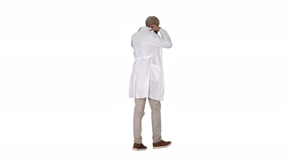 Walking Doctor Putting White Robe on on White Background.