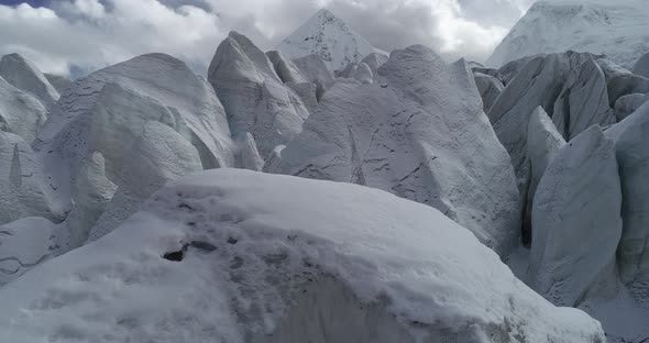 Flying drone approaching fossil glacier in tibet, China