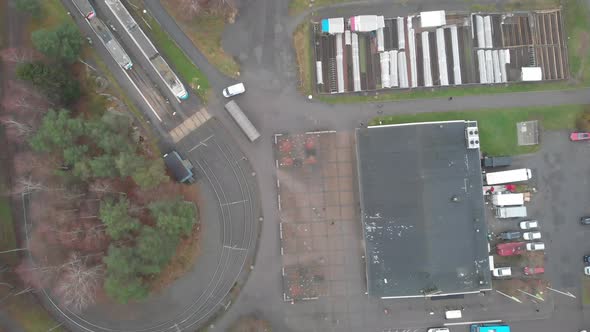 Tram Arrives and Departs Away at Suburban Bergsjon Gothenburg Aerial