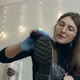 A Beautiful Young Woman Brushes Her Shoes Before Going to Work - VideoHive Item for Sale