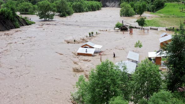 Aerial View of a Flood and Flooded Houses