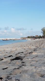 Vertical Video Boats in the Ocean Near the Coast of Zanzibar Tanzania