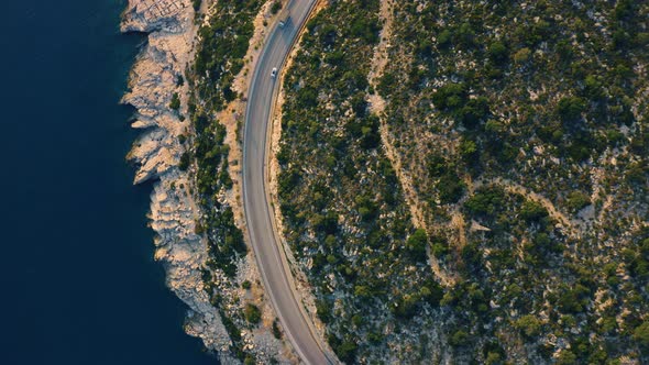 Aerial Drone View of Mountain Road Near the Turquoise Sea in Summer