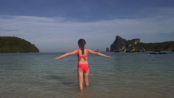 Little Girl Walks Into The Sea in 