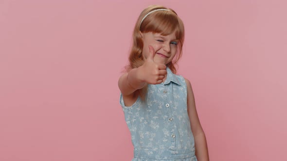 Happy Preteen Child Girl Kid Looking Approvingly at Camera Showing Thumbs Up Like Positive Sign