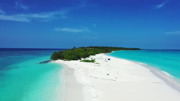 Aerial drone view tourism of beautiful resort beach wildlife by blue sea with bright sand background