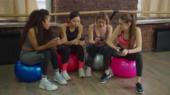 Relaxed Sporty Fit Females Resting After Training