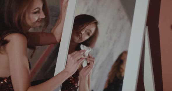 Cheerful Woman Breathes and Wipes the Mirror and Has a Fun Indoor