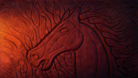 Horse Rock Carving With Dust Swirling In Fire Glow