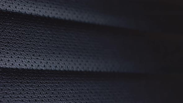 Black Corrugated Leather Texture Background - close up view