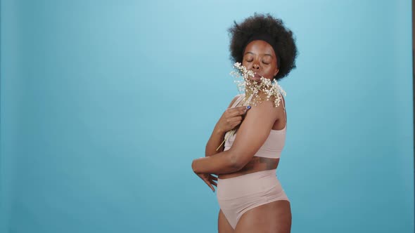 Tender Curvy Female with Babys Breath Flower