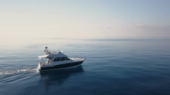 Aerial view of Motor boat on the azure sea of Montenegro