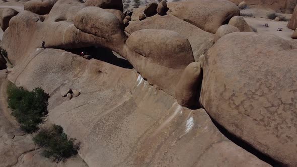 People are exploring the amazing round rocks in Erongo region, Namibia