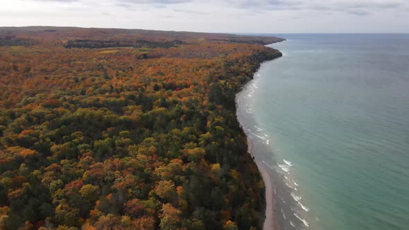 4k drone video of fall colors along Lake Michigan in Michigan.