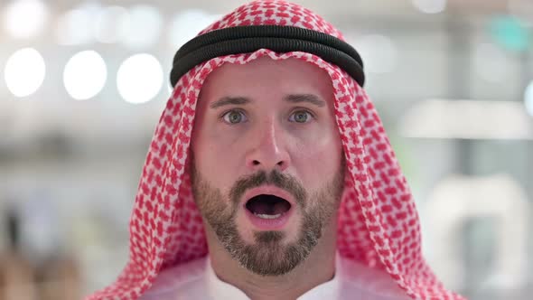 Close Up of Shocked Arab Man Face